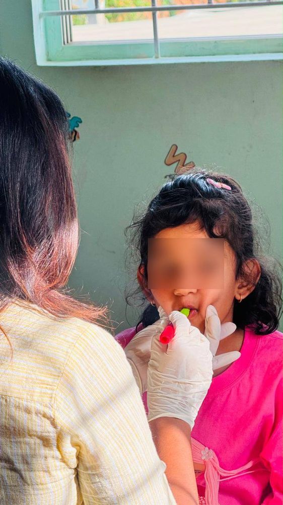 Oral placement therapy session with a young child